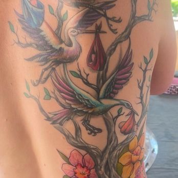 Triple R Tattoo & Art Studio - Storks carrying my 3 sons to the tree of life with my sons birth flowers. - Tattoo Near Me - Jamestown, California Triple R Tattoo & Art Studio - Storks carrying my 3 sons to the tree of life with my sons birth flowers. - Tattoo Near Me - Jamestown, California