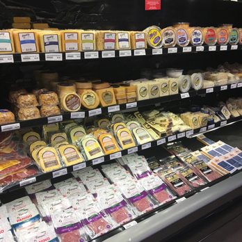 Liquor Barn - a variety of cheeses in a display case - Beer, Wine & Spirits Near Me - Bowling Green, Kentucky