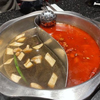 Supreme Hot Pot - Left: Mushroom Broth Right: Spicy Roast Chicken Honestly was so excited this was the only photo I got. - Hot Pot Near Me - Arlington, Virginia Supreme Hot Pot - Left: Mushroom Broth Right: Spicy Roast Chicken Honestly was so excited this was the only photo I got. - Hot Pot Near Me - Arlington, Virginia