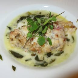 Char grilled monk fish tikka, spiced coconut broth