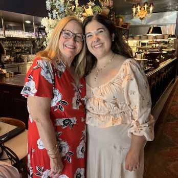 Tailleur - Myself and my dining companion in front of the beautiful flowers on the countertop. - Bakeries Near Me - Kansas City, Missouri Tailleur - Myself and my dining companion in front of the beautiful flowers on the countertop. - Bakeries Near Me - Kansas City, Missouri