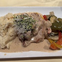 Restaurant Silberhorn - Pork schnitzel with a mushroom cream sauce, mashed potatoes and vegetables
