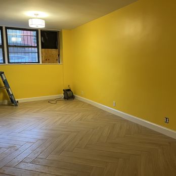 Zamin Construction - Herringbone tile job after leveling the floor. Fixing and painting walls. - General Contractors Near Me Zamin Construction - Herringbone tile job after leveling the floor. Fixing and painting walls. - General Contractors Near Me