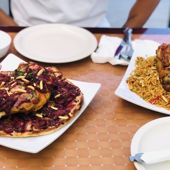 Al Sultan Restaurant - a plate of food on a table - Middle Eastern Near Me - Anaheim, California Al Sultan Restaurant - a plate of food on a table - Middle Eastern Near Me - Anaheim, California