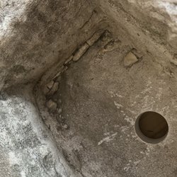 Big Daddy's Antiques - Chunks of stone on one side of the sink not sanded down. Sink is filthy.