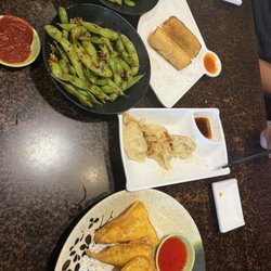 Edamame, Pork Gyoza (6 Pieces), Crab Rangoons and not pictured Crab Puff