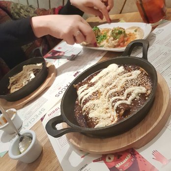 Lupita - Mole - chocolate sauce on shredded chicken interesting flavour - Mexican Near Me - London, XGL Lupita - Mole - chocolate sauce on shredded chicken interesting flavour - Mexican Near Me - London, XGL