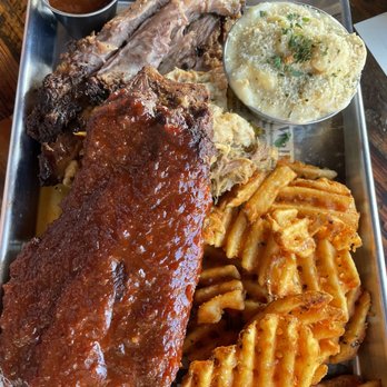 Whiskey 'N Rye Smokehouse - Trio platter with brisket (top), pulled pork (middle), and ribs (with glaze). Featuring the mac and cheese side and waffle fries :) - Barbeque Near Me - Solvang, California