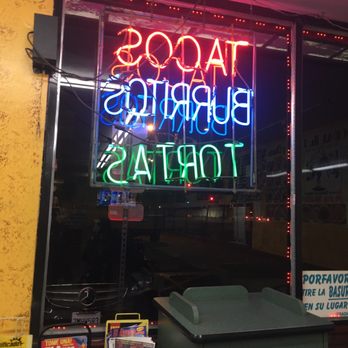 El Caporal - a neon sign for tacos burritos tortass - Mexican Near Me - Sun Valley, California