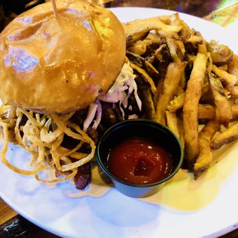 Draftcade - Porky's Revenge - Pulled Pork, Candied Bacon, Smoke Ham, Blueberry Habanero BBQ  Sauce, Jalapeno Cole Slaw and Onion Straw w/ Fries - YUMMY - Eatertainment Near Me - Kansas City, Missouri