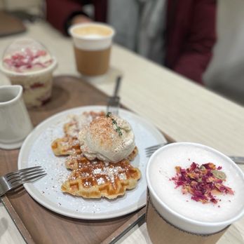 Cafe Auburndale - (From back to front) Hawaiian Latte, Strawberry Tirimisu, Croffle, and Rose Latte - Coffee & Tea Near Me - Flushing, New York