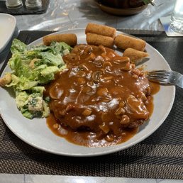 a plate of food on a table a plate of food on a table