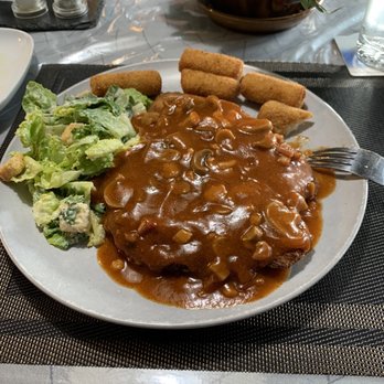 Haus Falkenstein - a plate of food on a table - German Near Me - Edmonton, Alberta Haus Falkenstein - a plate of food on a table - German Near Me - Edmonton, Alberta
