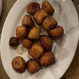 a plate of fried chicken nuggies a plate of fried chicken nuggies