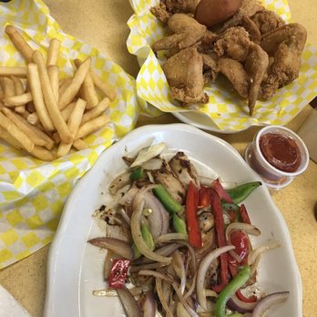 Sam's Southern Eatery - two plates of food - Seafood Near Me - Laplace, Louisiana Sam's Southern Eatery - two plates of food - Seafood Near Me - Laplace, Louisiana