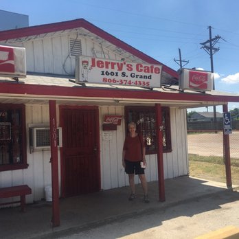 Jerry's Cafe - a woman standing in front of a restaurant - Tex-Mex Near Me - Amarillo, Texas