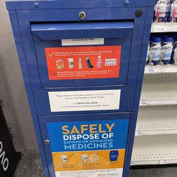 Stuck and jammed full bin next to unstacked shelves