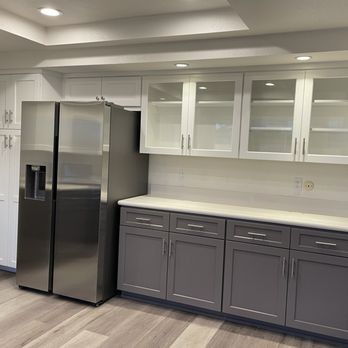 ReKitchen - Full glass cabinet doors replacing grid frame type to update the look. Two tone paint scheme to modernize and create interest. - Cabinetry Near Me - Torrance, California