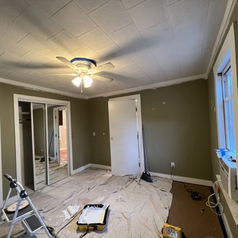 Yunga's landscape - an empty room with a ceiling fan - Landscaping Near Me Yunga's landscape - an empty room with a ceiling fan - Landscaping Near Me