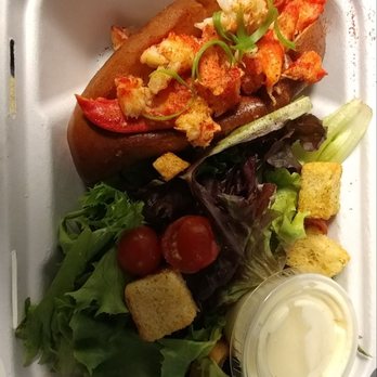 Garbo’s - Lobster roll with a side salad. Super good only thing is I never get a fork with my order I just lick my fingers afterwards - Seafood Near Me - Austin, Texas