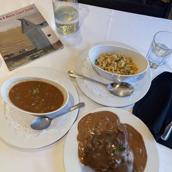 Highland Dell - Jaegerschnitzel on the bottom, Home-made German Spaetzle Pasta is at the top and goulash is on the left. - Hotels Near Me - Monte Rio, California
