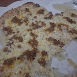 Half eaten but incredible flatbread, also with the sujuk. Can't remember the name but it's the cheesy galicky sujuk flatbread! Half eaten but incredible flatbread, also with the sujuk. Can't remember the name but it's the cheesy galicky sujuk flatbread!