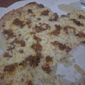 Royal Palm - Half eaten but incredible flatbread, also with the sujuk. Can't remember the name but it's the cheesy galicky sujuk flatbread! - Middle Eastern Near Me - Fairview Heights, Illinois Royal Palm - Half eaten but incredible flatbread, also with the sujuk. Can't remember the name but it's the cheesy galicky sujuk flatbread! - Middle Eastern Near Me - Fairview Heights, Illinois