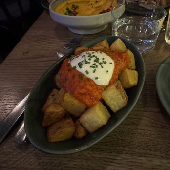 Mildreds - Cherry Harissa Patatas Bravas... very nice flavors together and potatoes just crispy!! - Vegan Near Me - London, XGL Mildreds - Cherry Harissa Patatas Bravas... very nice flavors together and potatoes just crispy!! - Vegan Near Me - London, XGL