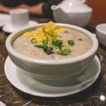 MingHin Cuisine - Congee - Pork with preserved egg (gives this a bit of a salty kick with some texture) - Dim Sum Near Me - Chicago, Illinois MingHin Cuisine - Congee - Pork with preserved egg (gives this a bit of a salty kick with some texture) - Dim Sum Near Me - Chicago, Illinois