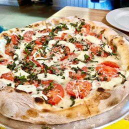 a pizza on a pan a pizza on a pan