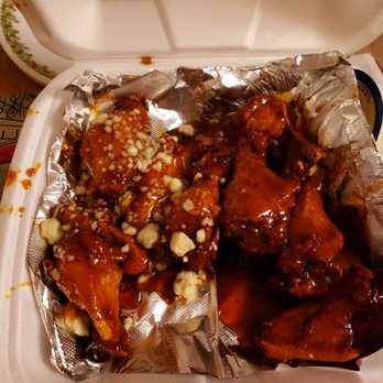 Macy's Place - You can get up to 3 different wing flavors. This picture contains half drunken money and half chipotle bbq. - Pizza Near Me - Buffalo, New York Macy's Place - You can get up to 3 different wing flavors. This picture contains half drunken money and half chipotle bbq. - Pizza Near Me - Buffalo, New York