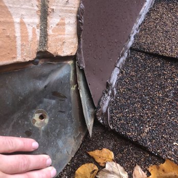 Rock Roofing - Hole in flashing - Roofing Near Me