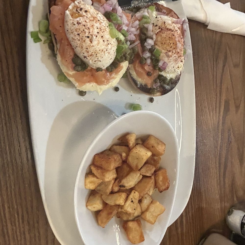 Another Broken Egg Cafe - Salmon Eggs Benedict with Country Potatoes - Breakfast & Brunch Near Me - Austin, Texas Another Broken Egg Cafe - Salmon Eggs Benedict with Country Potatoes - Breakfast & Brunch Near Me - Austin, Texas