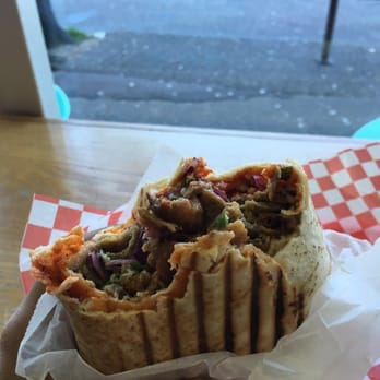 Donair Dude - Lamb pita donair with tatziki and hot sauce - Middle Eastern Near Me - Vancouver, British Columbia Donair Dude - Lamb pita donair with tatziki and hot sauce - Middle Eastern Near Me - Vancouver, British Columbia
