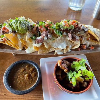 Margaritas - Steak nachos with a side of pork belly and Salsa Roja (red). - Mexican Near Me - Honolulu, Hawaii Margaritas - Steak nachos with a side of pork belly and Salsa Roja (red). - Mexican Near Me - Honolulu, Hawaii