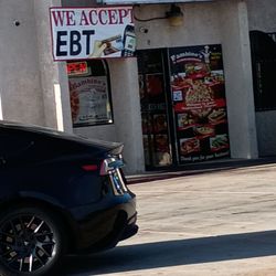 Bambino's Pizzaria & Deli - San Diego - Sign stating "we accept EBT"