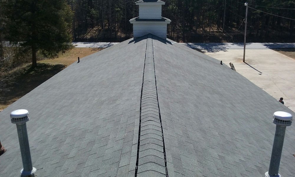 Slide of Tim's Roofing