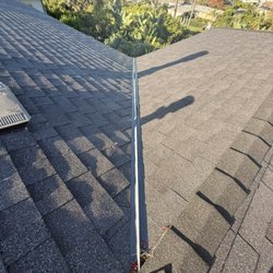 KJC Roofing - Open valley. Clean lines. New roof installed beautifully in Laguna Beach.
