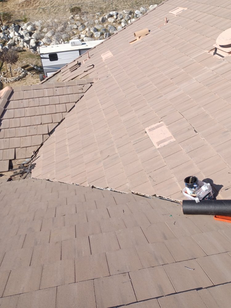 Slide of Moses Roofing