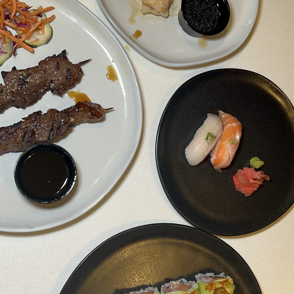 Beef Skewer Dim Sum Sake Toro (Fatty Salmon) Nigiri  Godzilla Roll Hamachi (yellowtail) Nigiri Orange Dragonorange