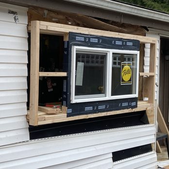 The Handy Viking - a window being installed on the side of a house - Handyman Near Me The Handy Viking - a window being installed on the side of a house - Handyman Near Me