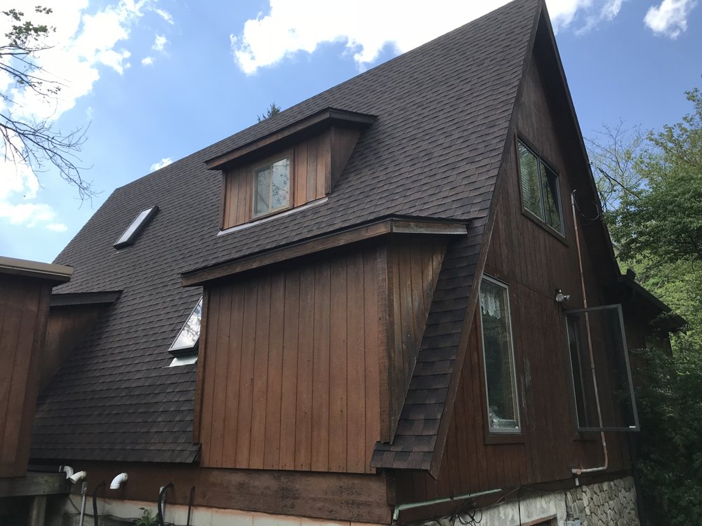 Slide of Madcat Roofing