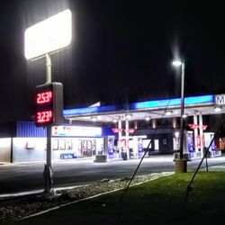 Mobile & One Stop Food Store - Night pic of mobile & one stop food store looking East.