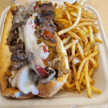Izzy's Cheesesteaks - Looks can be deceiving...steak cheesesteak with garlic fries. It looks yummy but unfortunately the meat was dry and flavorless. - Food Trucks Near Me - South San Francisco, California Izzy's Cheesesteaks - Looks can be deceiving...steak cheesesteak with garlic fries. It looks yummy but unfortunately the meat was dry and flavorless. - Food Trucks Near Me - South San Francisco, California