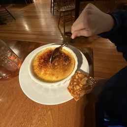 White chocolate crème brûlée served with almond brittle White chocolate crème brûlée served with almond brittle