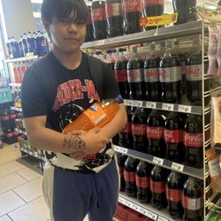 7-Eleven - My friend with 2 litre drinks