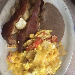 Migas, beans, potatoes, with an order of bacon! World Class! Migas, beans, potatoes, with an order of bacon! World Class!