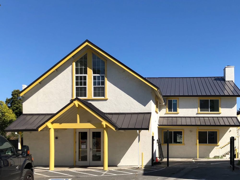 Slide of Exclusively Roofing