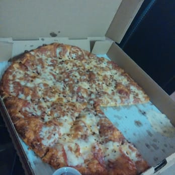Uncle Tony's - Medium pizza with the crunchy thin crust - Italian Near Me - Valley Glen, California