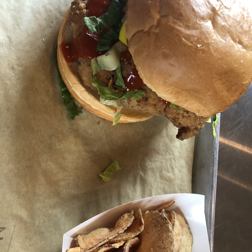 Nomad Eatery - Spicy chicken sandwich with homemade salt and vinegar chips - New American Near Me - South Jordan, Utah Nomad Eatery - Spicy chicken sandwich with homemade salt and vinegar chips - New American Near Me - South Jordan, Utah